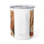 A white insulated tumbler with a clear lid and a vertical handle, featuring a printed autumn floral and grass pattern on the sides, shown on a white background.