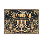 A rectangular woven tapestry with fringe on the edges, featuring a Hanukkah design. The tapestry has a dark navy blue background decorated with gold and silver lettering that reads 'Happy Hanukkah Festival of Lights', a golden menorah in the center, lanterns, stars, and dreidels.