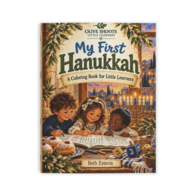 Front cover of the children's coloring book 'My First Hanukkah' by Beth Estevis, published by Olive Shoots Little Learners. The cover features a festive illustration of three children coloring in a book at a table, with a menorah, pastries, and a Hanukkah cityscape in the background.