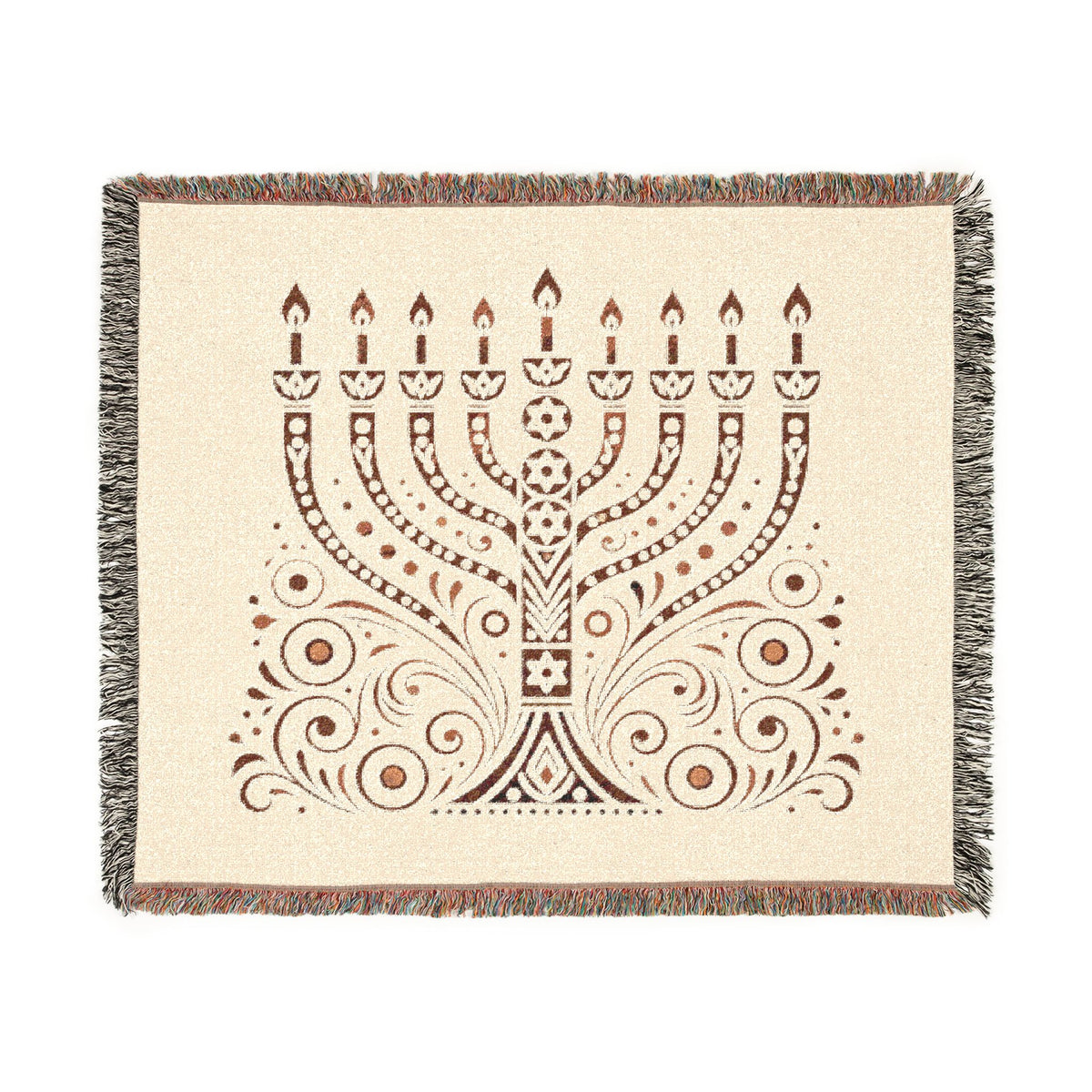 A square woven throw blanket with fringed edges, featuring a brown menorah and ornamental scroll pattern on a warm cream background.