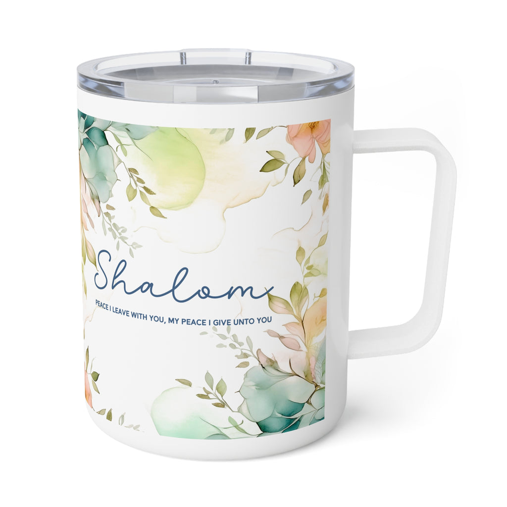 A white insulated travel mug with a clear lid and handle, decorated with a watercolor floral design in soft green, peach, and blue tones, featuring the word 'Shalom' and a small quote on a white background.