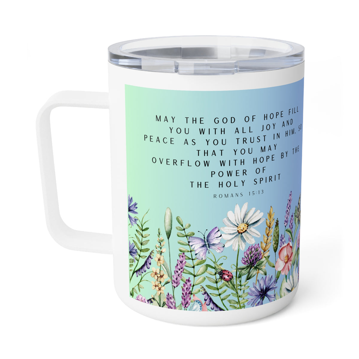 A white insulated coffee mug with a clear lid, featuring a printed design with a Bible verse from Romans 15:3-4 and colorful wildflowers on a pastel blue-green background.