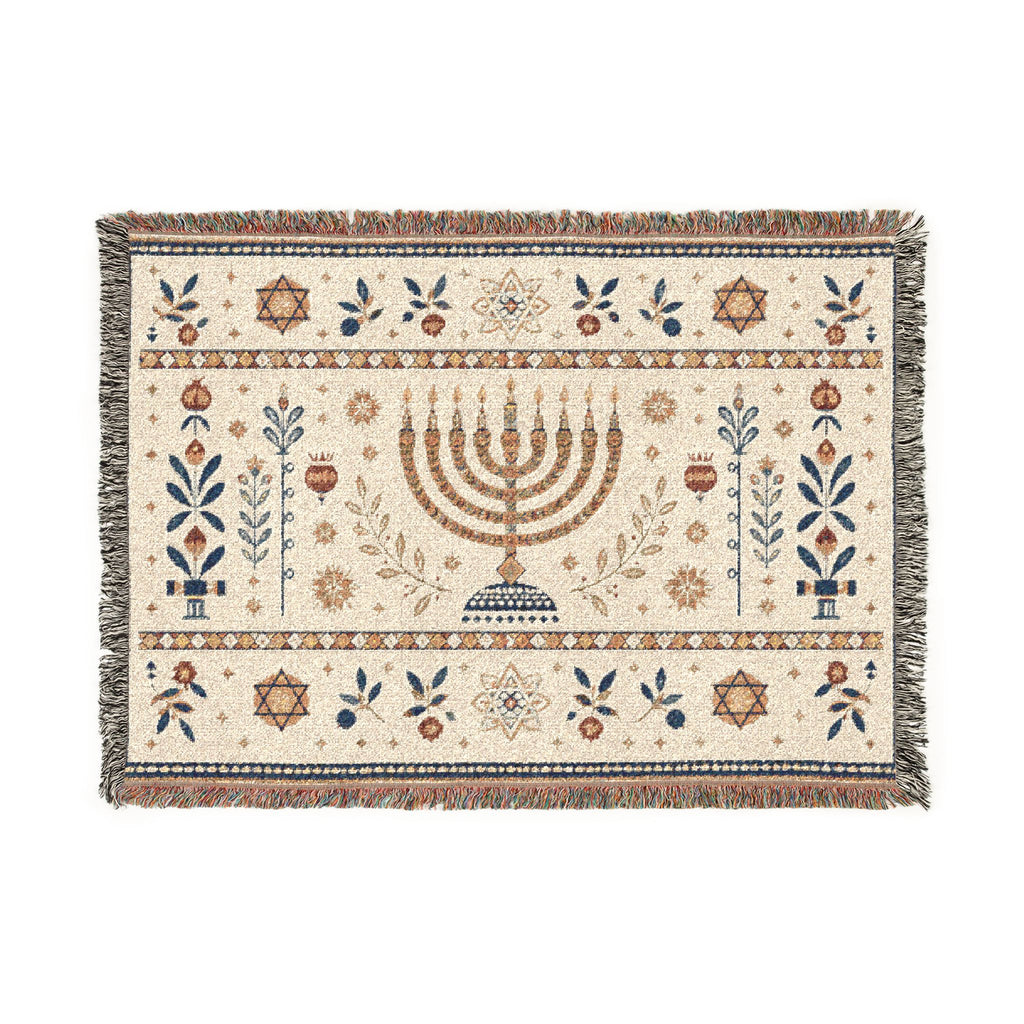 A rectangular woven tapestry rug with a central menorah motif and decorative floral and geometric borders, shown flat against a plain white background.
