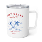 A white insulated travel mug with a clear lid and handle, featuring a blue tropical beach illustration and red text that reads 'STAY SALTY You Are The SALT OF THE EARTH' with 'Matthew 5:19' below.