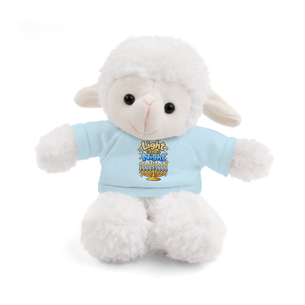 White plush lamb toy wearing a light blue shirt with text and a graphic on a white background
