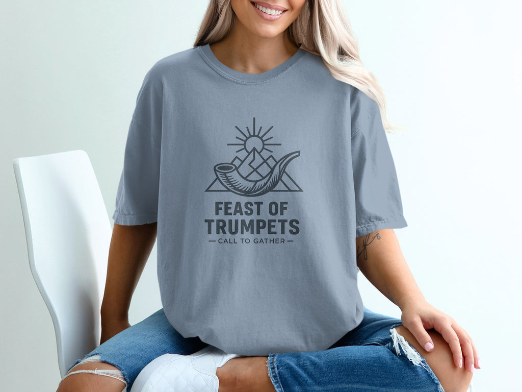 T-shirt with "Feast of Trumpets - Call to Gather" text and a graphic.