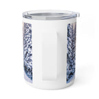 A white insulated travel mug with a clear lid and a printed winter forest design on the sides, shown on a clean white background.