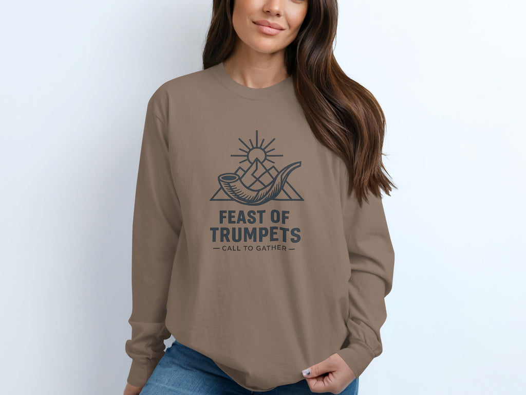 Brown crewneck sweatshirt with "Feast of Trumpets - Call to Gather" graphic.