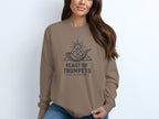 Brown crewneck sweatshirt with "Feast of Trumpets - Call to Gather" graphic.
