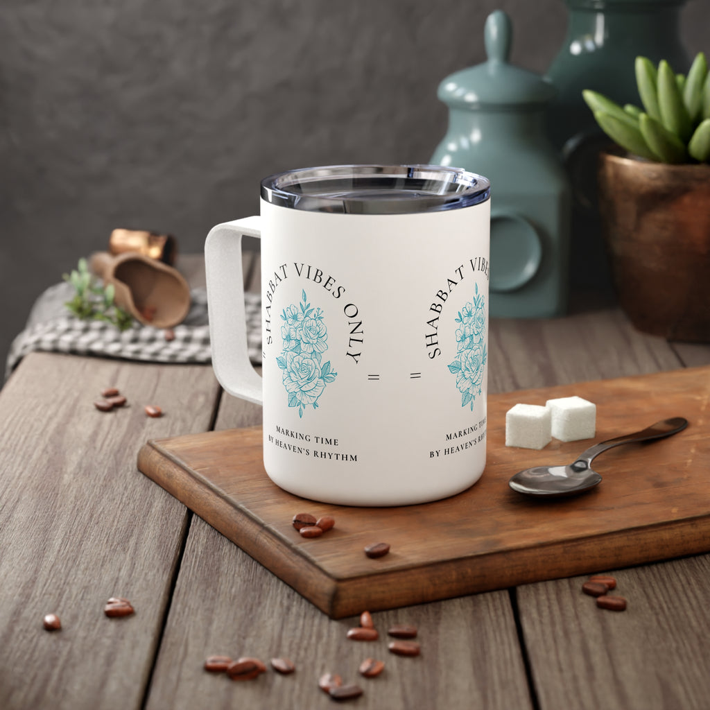 White mug with 'Shabbat Vibes Only' logo on a wooden cutting board with coffee beans and sugar cubes.