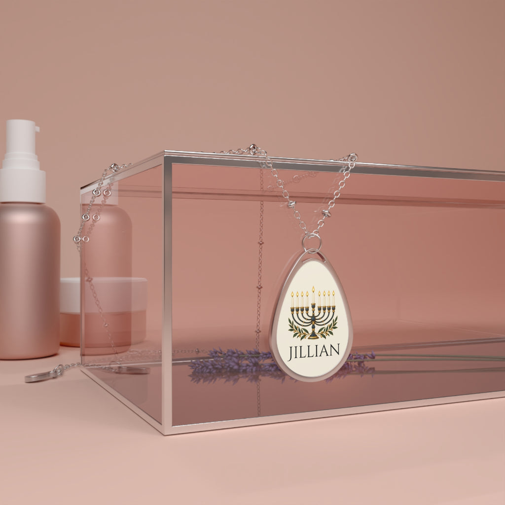 Teardrop-shaped pendant with 'I ❤️ MAGA TEARS' text on a pink background