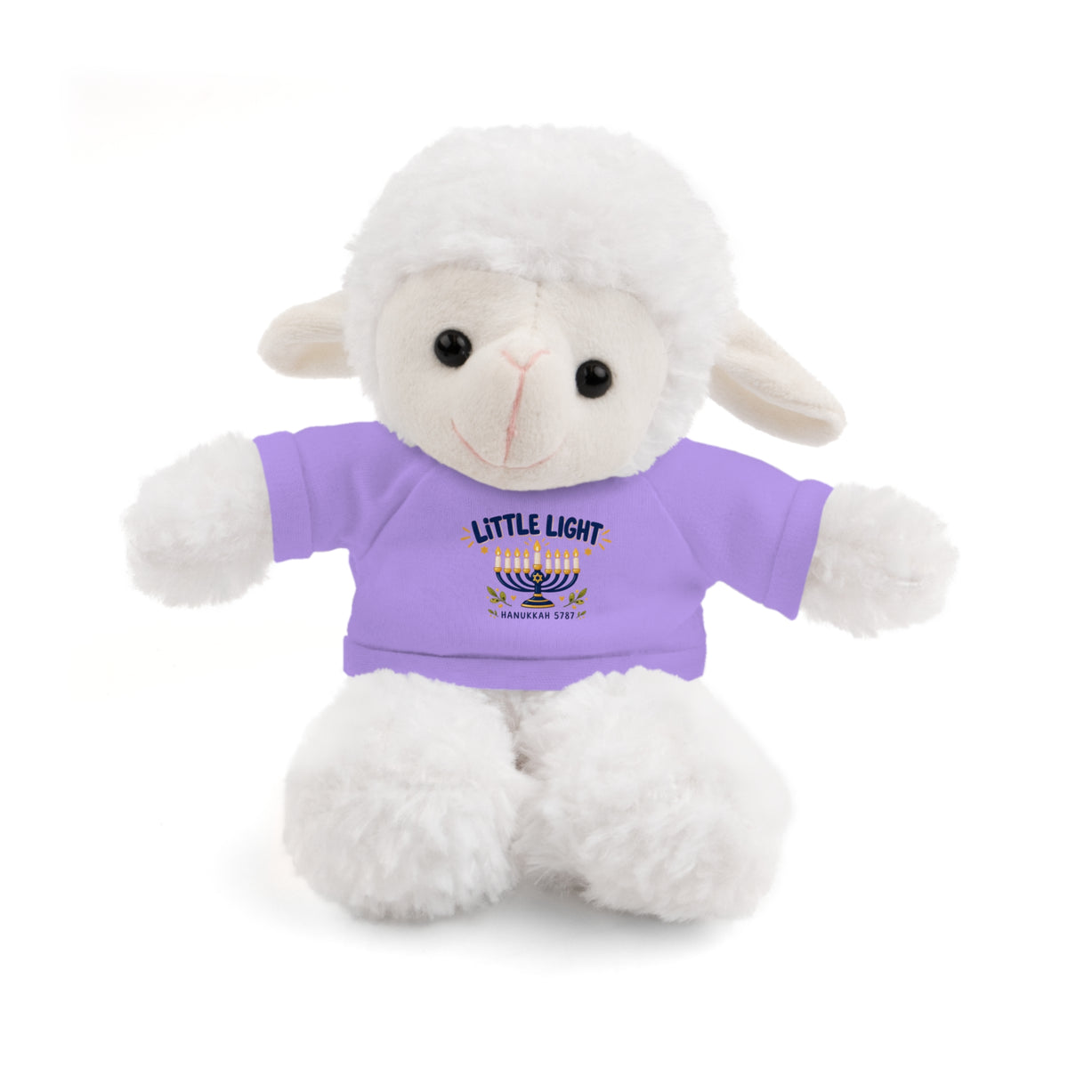 A white plush lamb toy wearing a lavender purple t-shirt with a printed graphic that reads 'LITTLE LIGHT Hanukkah MERRY YOU!' and a menorah illustration, shown on a clean white background.