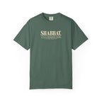 Green t-shirt with a small logo on a white background