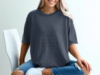 Dark grey t-shirt with "Feast of Trumpets - Call to Gather" text and graphic.