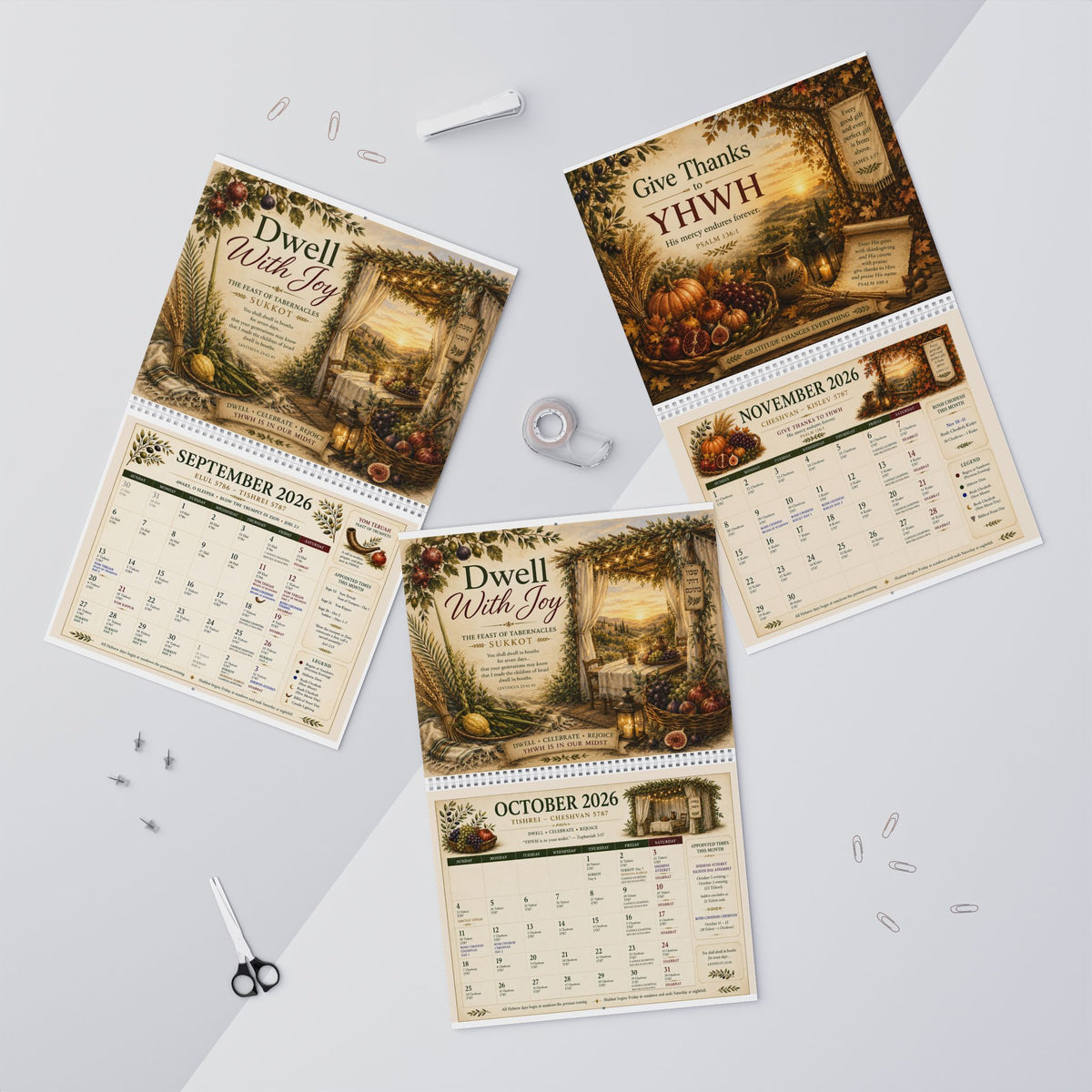 Several Appointed Times calendar pages, including Dwell With Joy and Give Thanks, spread on a gray desk