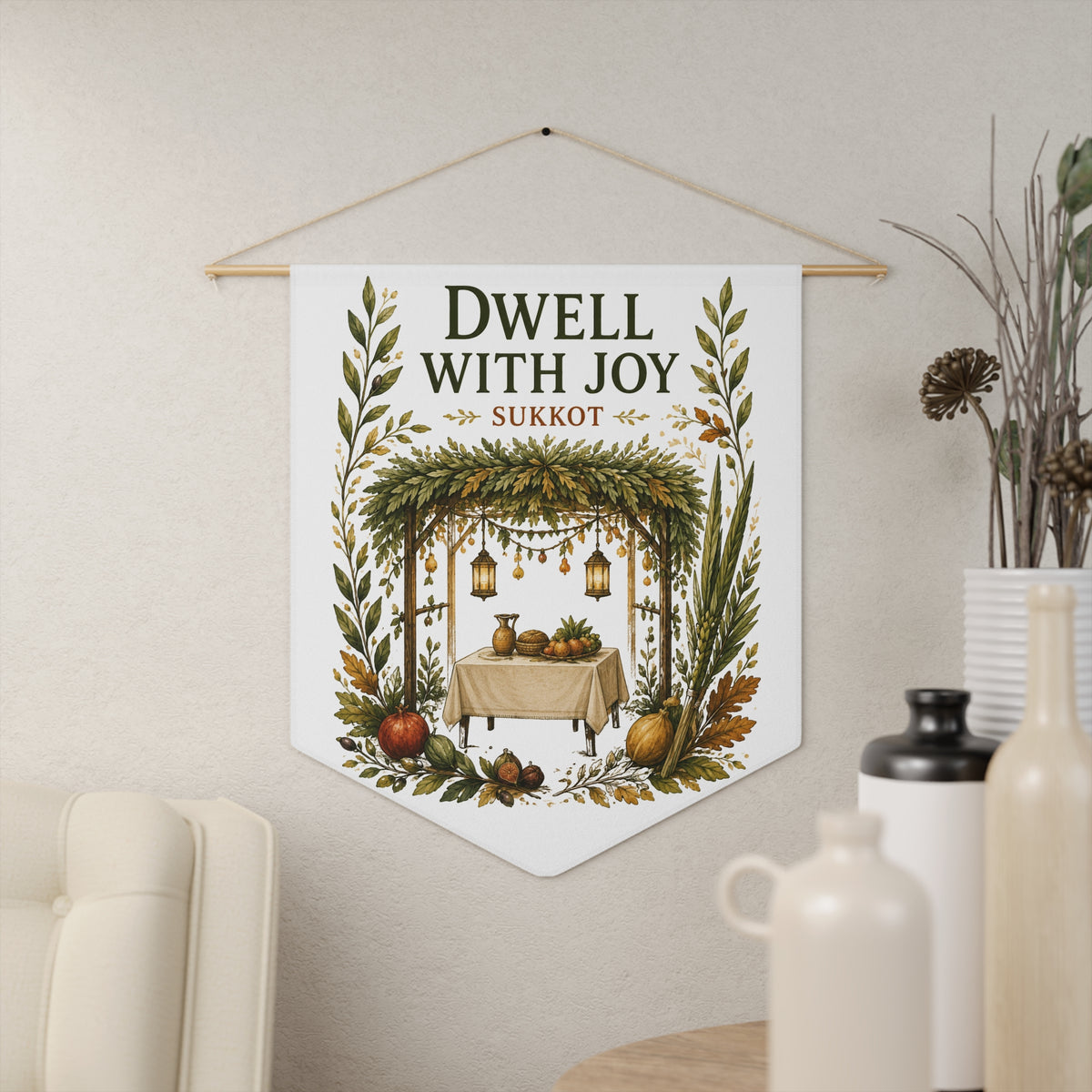 Dwell With Joy wall pennant with a leafy sukkah, lanterns, a harvest table and Sukkot, in a living room
