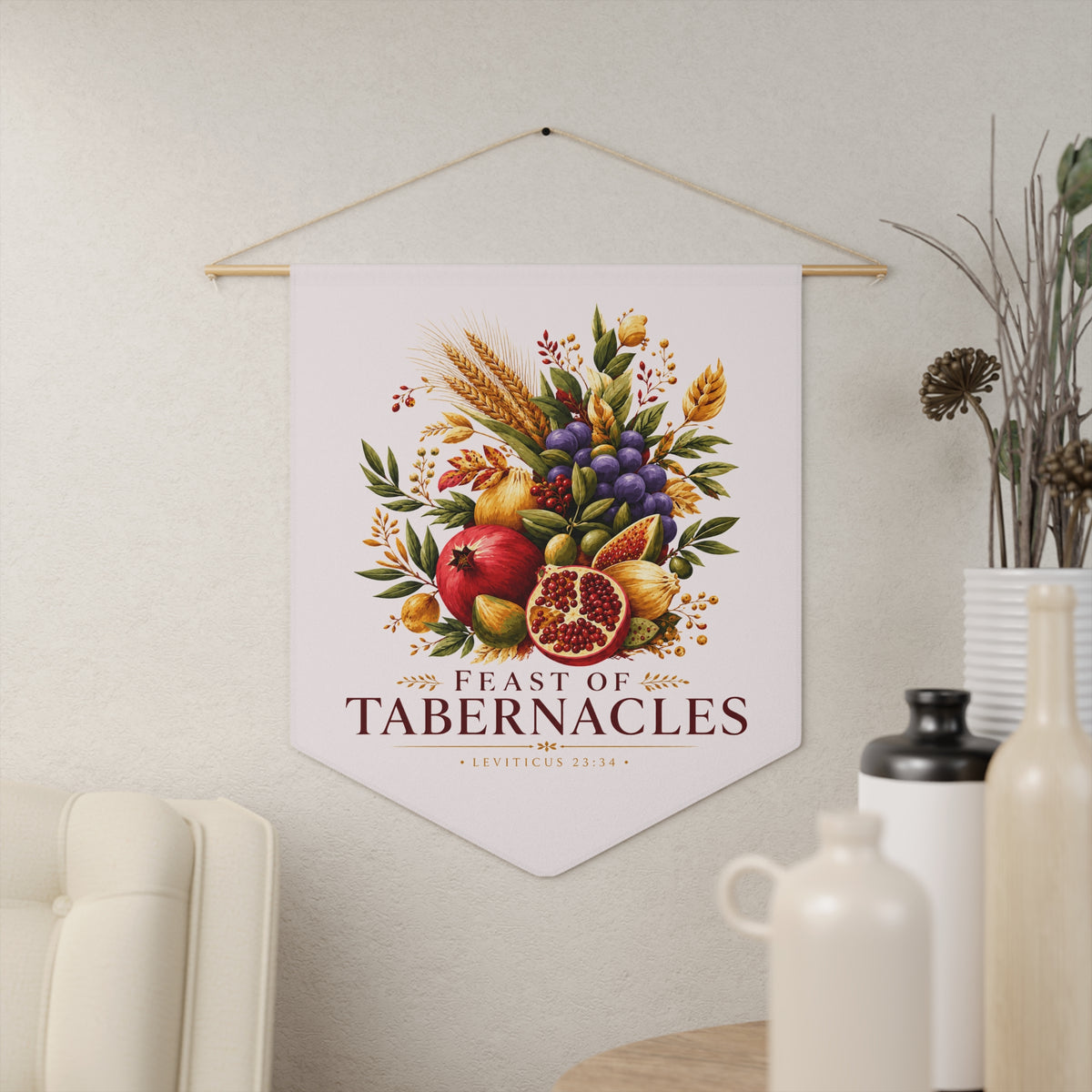 Feast of Tabernacles wall pennant with a harvest of pomegranates, grapes and wheat above Leviticus 23:34, in a living room