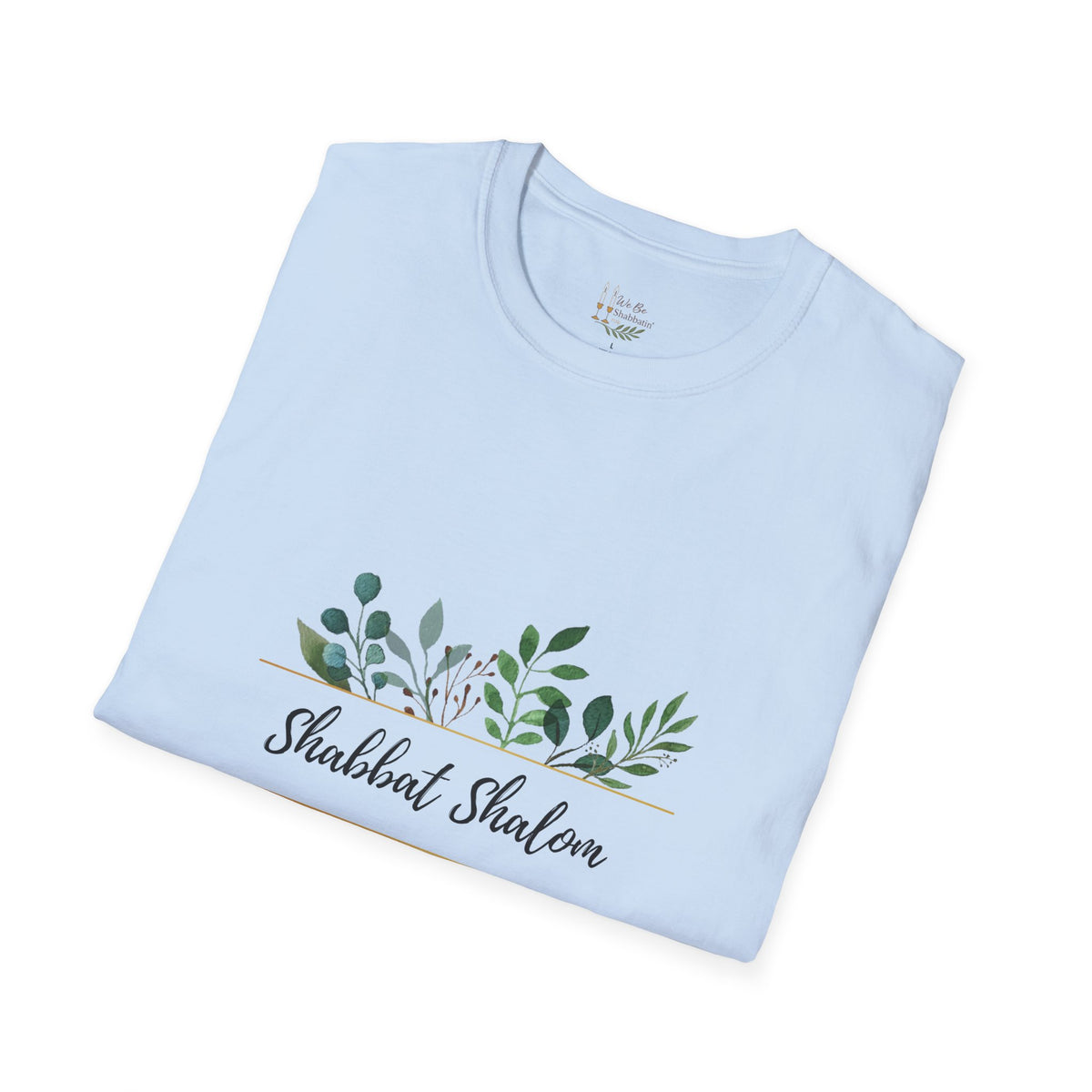 Folded light blue Shabbat Shalom t-shirt showing the script lettering and green leaves