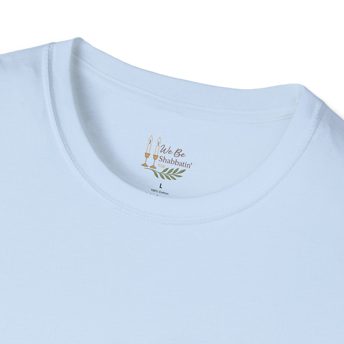Close-up of the We Be Shabbatin' neck label inside a light blue t-shirt