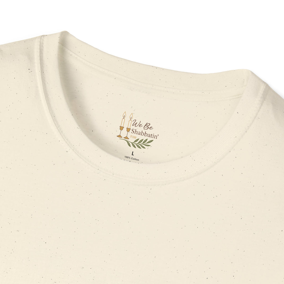Close-up of the We Be Shabbatin' neck label inside a natural t-shirt
