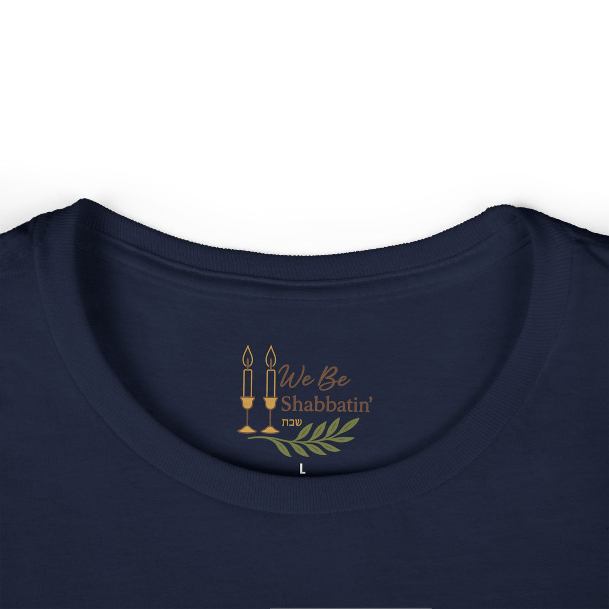 Close-up of the We Be Shabbatin' neck label inside a navy t-shirt