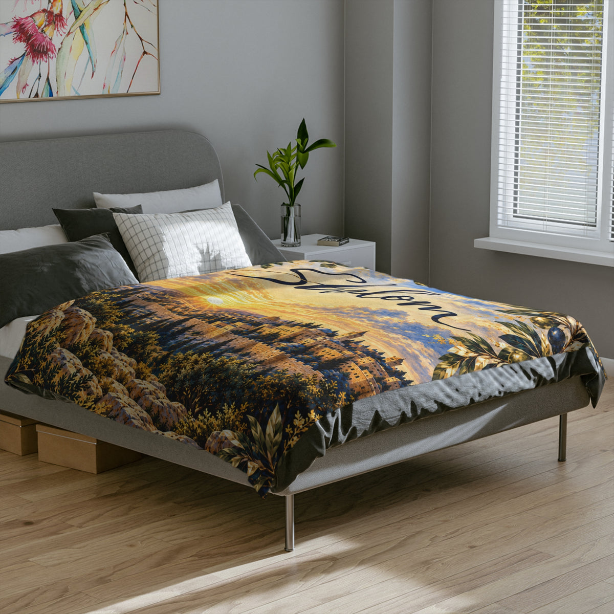Shalom Jerusalem blanket with golden sunset over Jerusalem covering the top of a gray bed