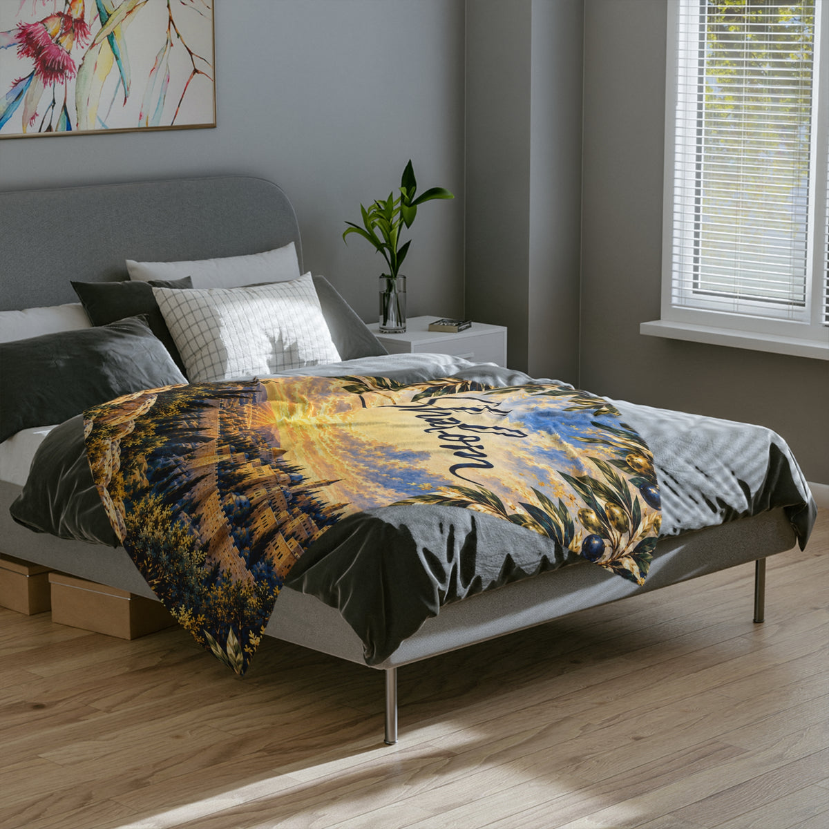 Shalom Jerusalem blanket with Shalom script and golden sunset spread across a gray bed