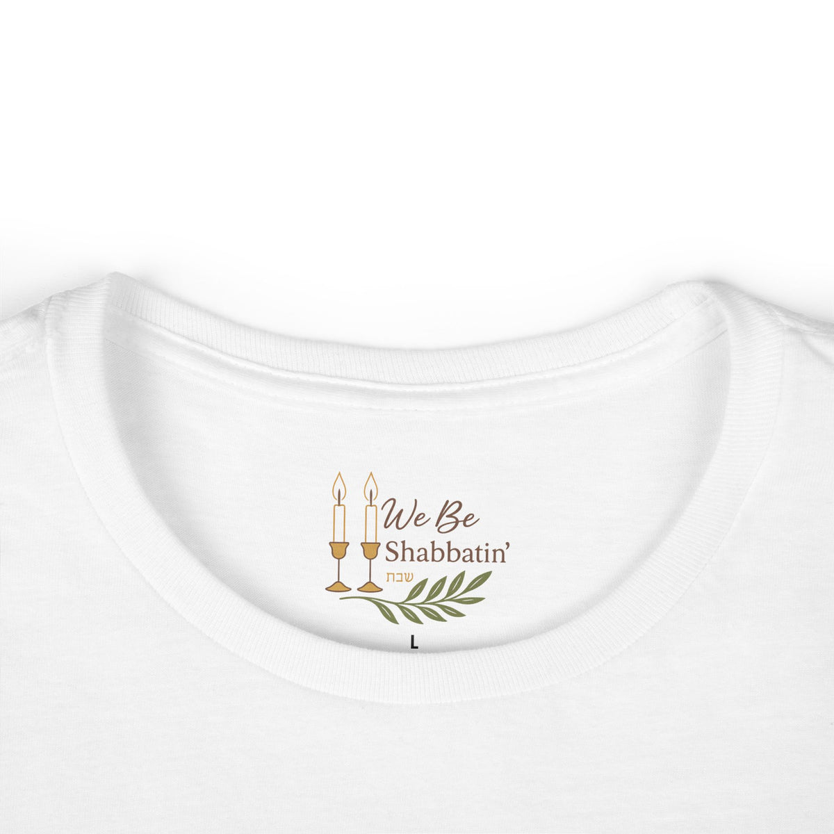 Close-up of the We Be Shabbatin' neck label inside a white t-shirt