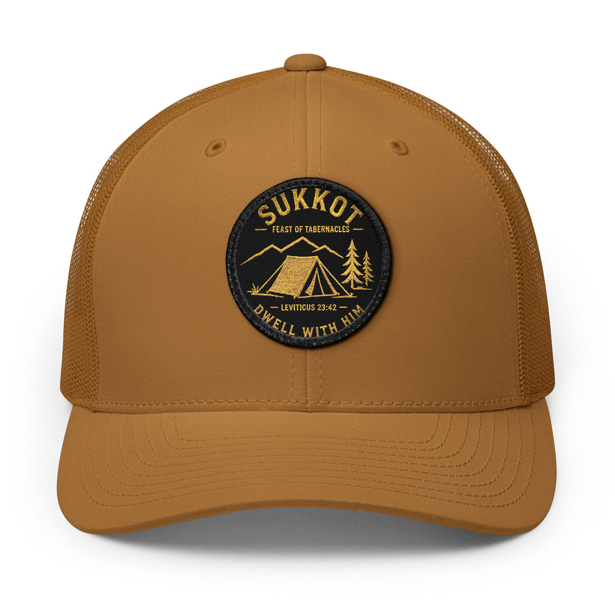 Caramel brown trucker cap with a round Sukkot Dwell With Him patch with a gold tent, mountains and Leviticus 23:42, front view