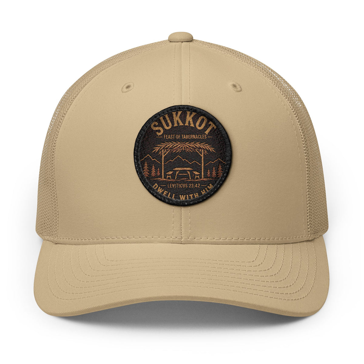 Khaki trucker cap with a round Sukkot Dwell With Him patch showing a sukkah, mountains and Leviticus 23:42, front view