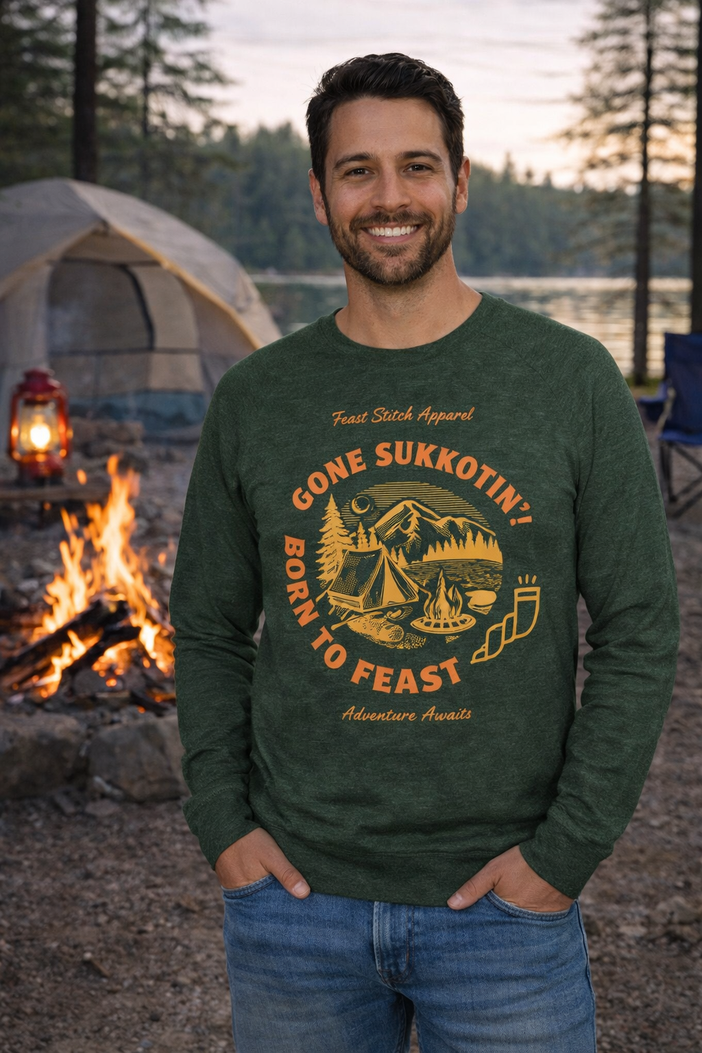 Heather forest green Gone Sukkotin' Born to Feast long sleeve shirt with a gold camping design, worn by a man at a campsite