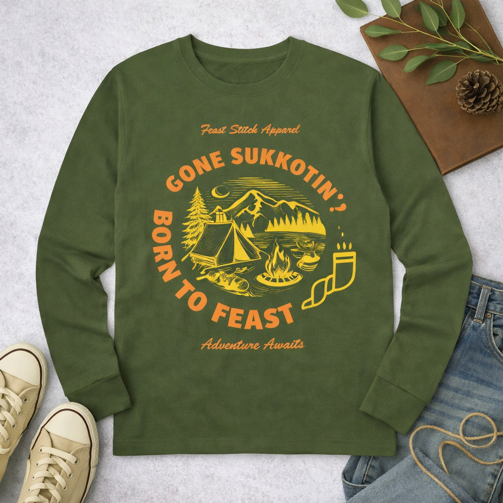 Military green Gone Sukkotin' Born to Feast long sleeve shirt with an orange camping and shofar design, laid flat