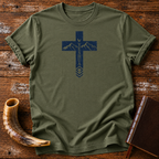 Military green Yeshua cross t-shirt with mountains and a dove, laid flat with a shofar and Bible
